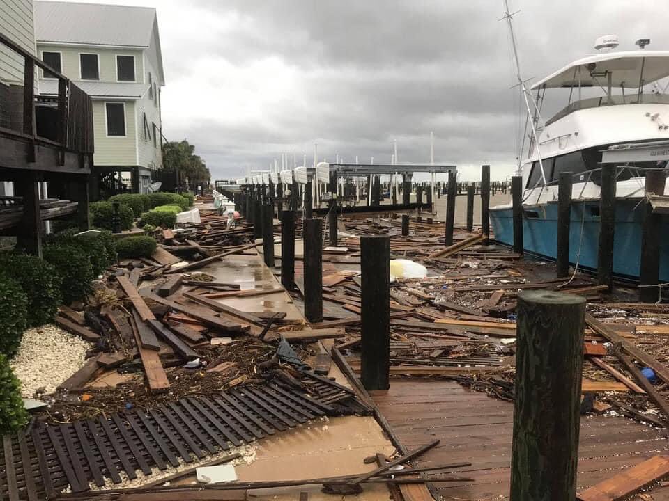 Considerable surge and wind damage photos continue to come in this morning with damage to boats and buildings from Dauphin Island, AL