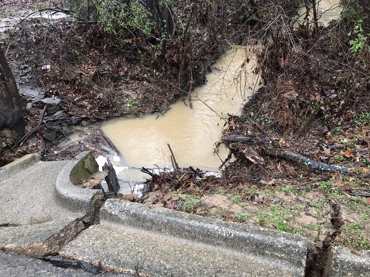 pipe busted due to heavy rain and flooding and that's what they believe caused the road to collapse