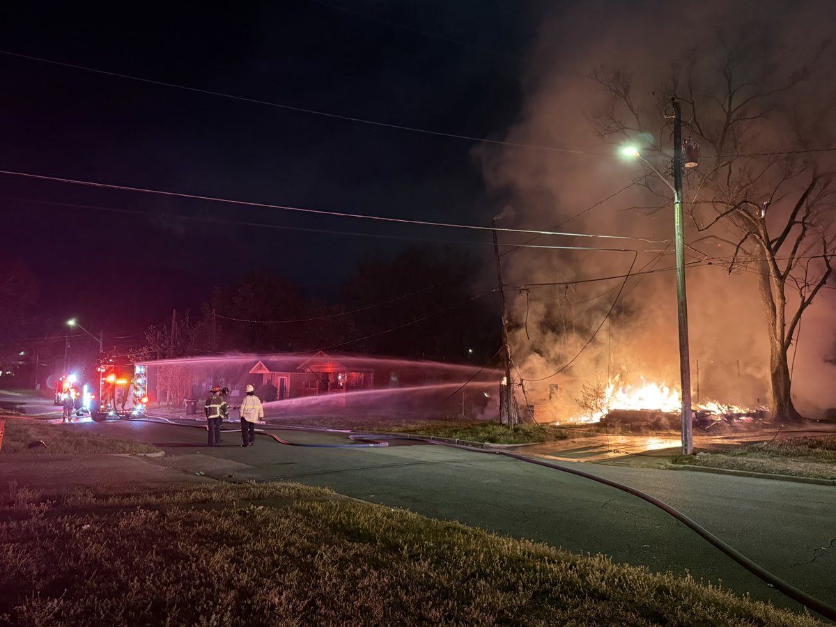 Heavy flames being shown at a structure on Rev Abraham Woods Jr blvd and 4th St N. This is across the street from A.H. Parker High School