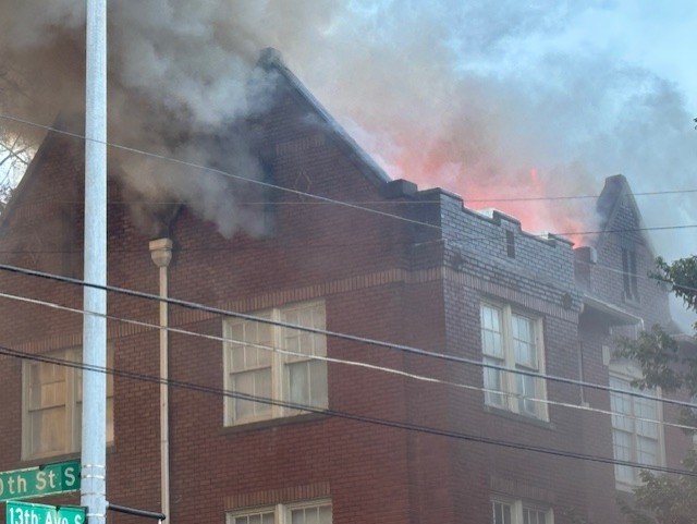 Crews in Birmingham continue to fight a fire that has involved four structures on 20th Street South. No injuries reported at this time